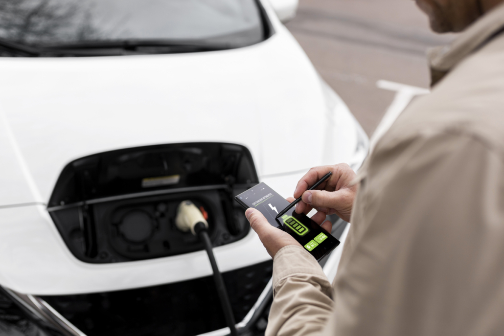 The EV electric car charger is charging the EV