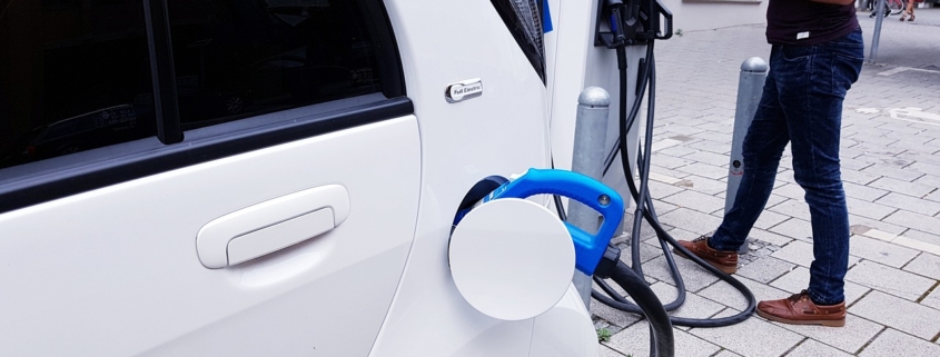 An electric car is charging